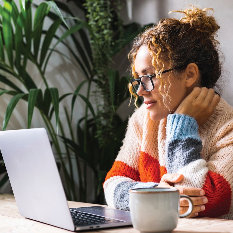 Image of woman working at a computer